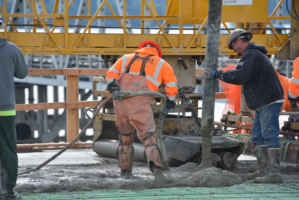 May 10, 2014 - Crews work together to pour concrete
